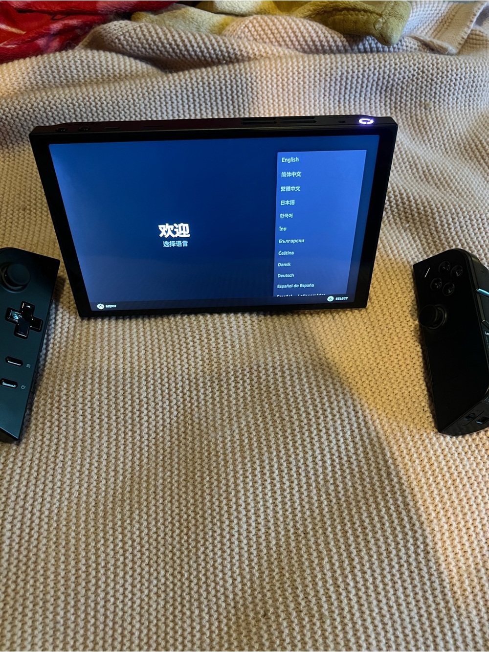 Black Handheld Gaming Console with Detachable Controllers - Portable Play